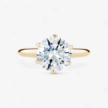 Blonde Solitaire Engagement Ring V-Shape Setting Round Cut