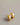 A close-up of a pair of minimalist, high-gloss oval bean stud earrings plated in 18K real gold, featuring a hollow back design and 925 sterling silver posts, resting on a smooth grey background.-4