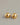 A close-up of a pair of minimalist, high-gloss oval bean stud earrings plated in 18K real gold, featuring a hollow back design and 925 sterling silver posts, resting on a smooth grey background.-6