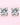 A pair of authentic D-color Moissanite solitaire stud earrings featuring a classic 4-prong sterling silver setting, displayed against a soft pink background.-2