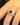 A detailed product diagram of a silver ring featuring a 6x8mm oval royal blue cultivated sapphire center stone, surrounded by 2.5x3.5mm teardrop and 1.1mm-1.7mm round clear accent stones on a 4.13mm wide S925 sterling silver band-4