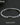 A close-up of a premium silver-tone stainless steel tennis bracelet, fully iced out with a single row of sparkling cubic zirconia stones, featuring a secure box clasp, resting on a textured black background.-1