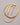 A close-up of a long, thick gold snake chain necklace showing its smooth, fluid flat herringbone texture, featuring a lobster clasp and a 5cm extension chain, resting on a clean grey background.-2