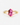 Concept image of a pink hexagonal sapphire bezel ring with split gold-color shoulders, front view.