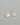 Evergleam Jewelry square stud earrings featuring iridescent mother of pearl mosaic tiles and matte gold U-bar accents.
